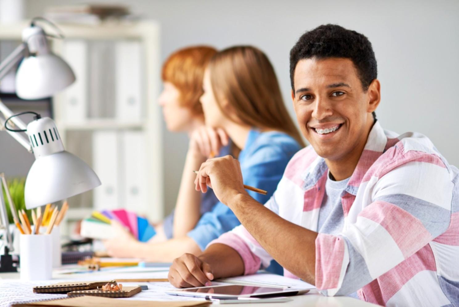 Professional reviewing detailed budget spreadsheets and financial reports